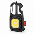 Black NightClip carabiner light with yellow LED panel