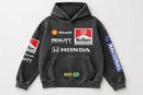 Black Senna-inspired hoodie showing front panel and sleeve graphics